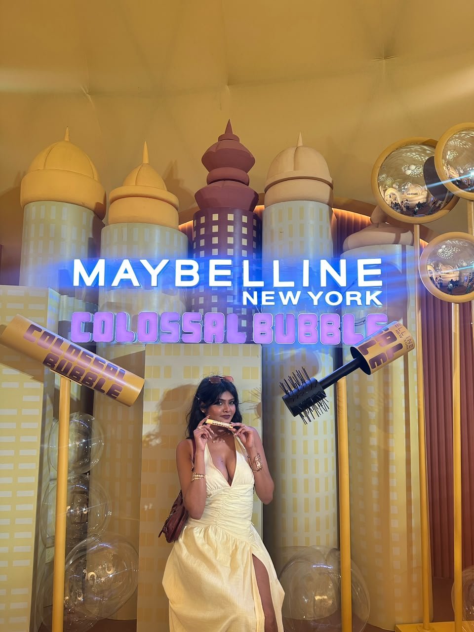 Vaishnavi Kadekar in a white halter dress at the Maybelline New York Colossal Bubble installation